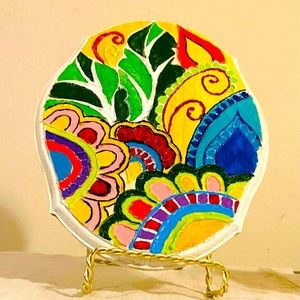 Wooden painting with clay henna design